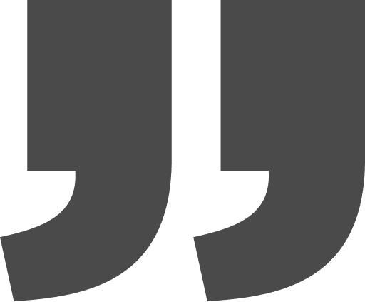 Dark gray quotation marks on black background.